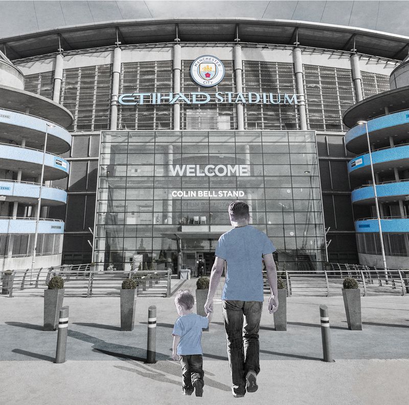 father son at the etihad stadium